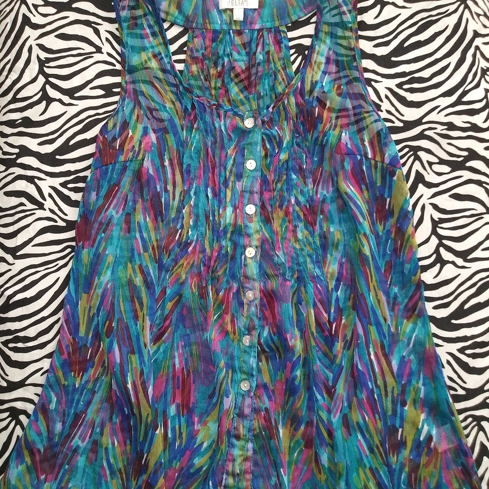 Women's flowy multi color no sleeve shirt.